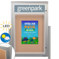 Freestanding EXTREME WeatherPLUS™ Radius Edge Outdoor Enclosed Bulletin Boards with Personalized Message Header + LED Lights | Shown in Silver Finish in Portrait Orientation